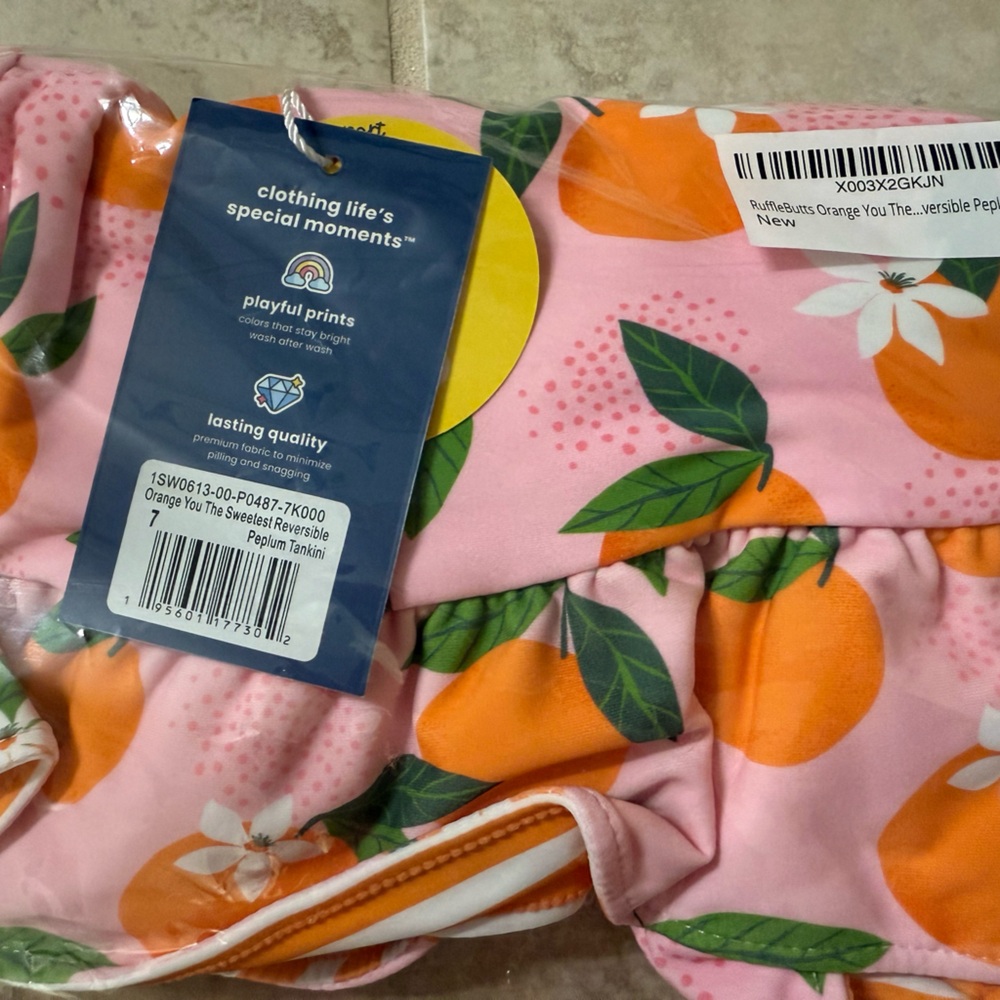 NWT rufflebutts orange you the sweetest reversible tankini size 7